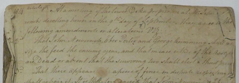 Handwritten page from an 1814 record book that describes the organization of dyke fields, livestock kept, and administration of the fields.
