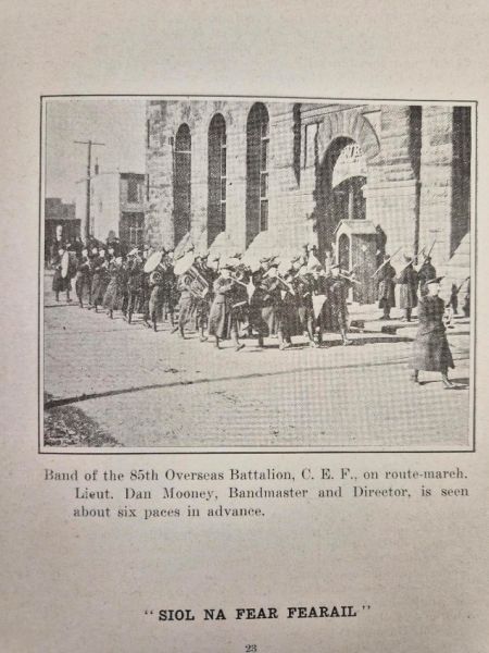 The Band of the 85th Overseas Battalion, on route-march in front of an armory (probably Halifax, but that is not verified).