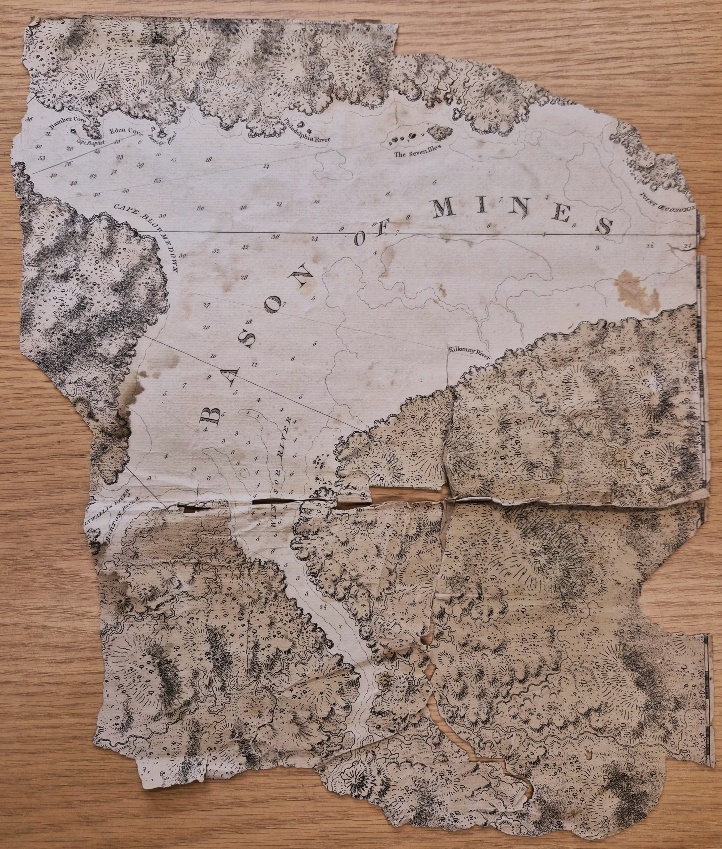 A fragment of the Minas Basin map in The Atlantic Neptune. The paper is unevenly torn around its edges.